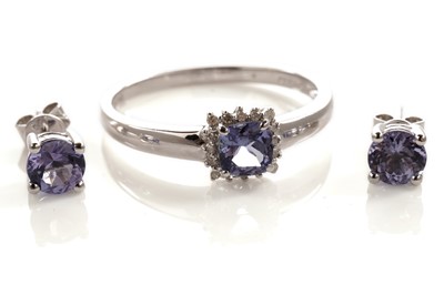Lot 151 - A tanzanite and diamond cluster ring; and a pair of tanzanite earrings