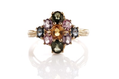 Lot 144 - A fancy sapphire cluster ring