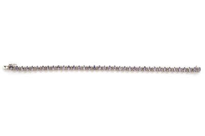 Lot 158 - A tanzanite and diamond tennis bracelet