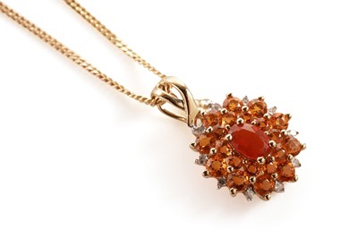 Lot 142 - A fire opal and diamond cluster pendant necklace
