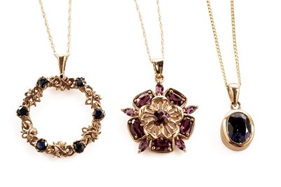 Lot 149 - Three gemstone set gold pendant necklaces