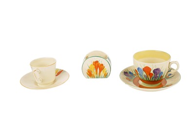 Lot 390 - A Clarice Cliff ‘Spring Crocus’ pattern coffee cup and saucer; and other items