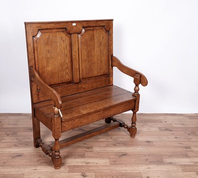 Lot 6 - An 18th Century style oak settle/bench