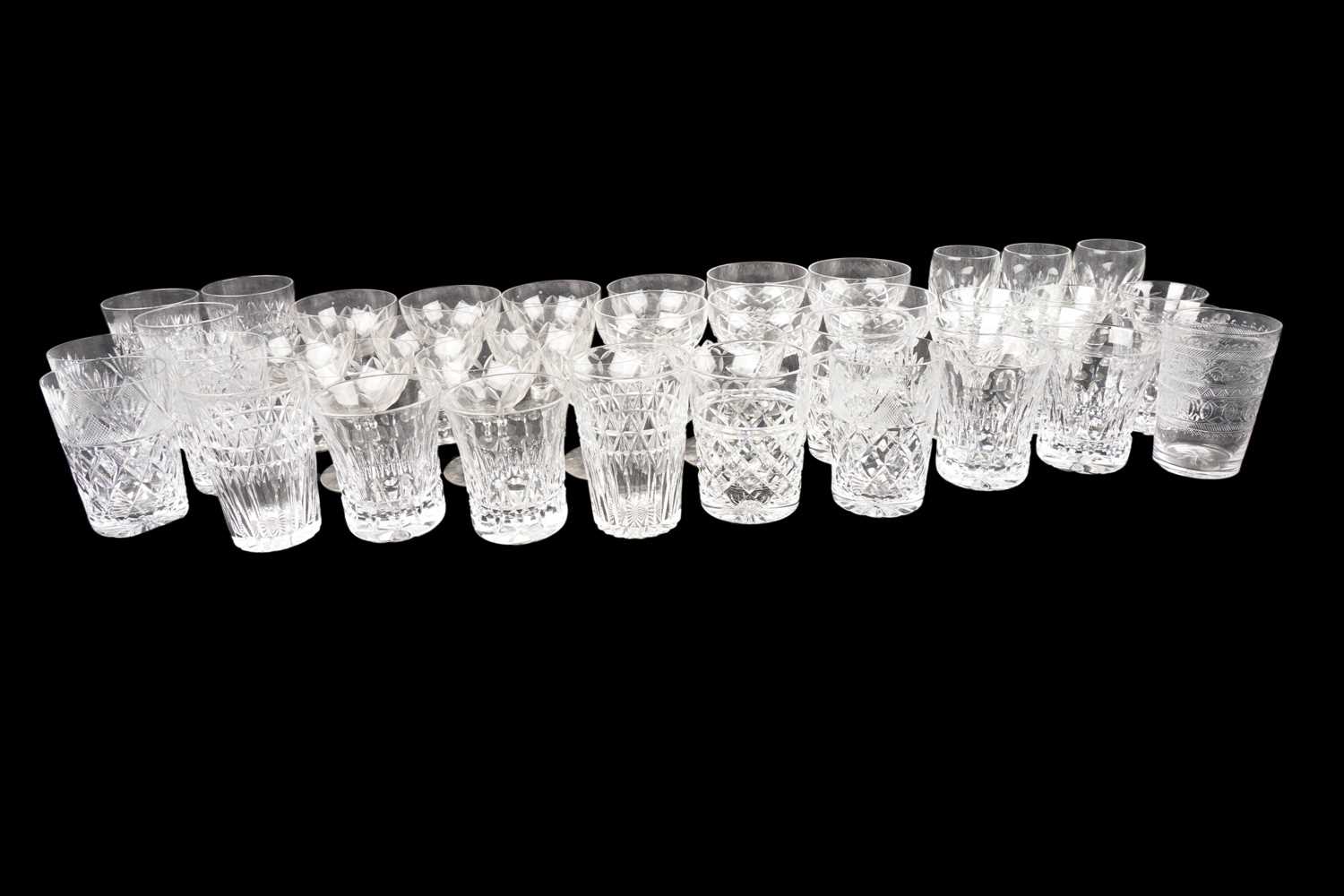 Lot 102 - An assortment of glassware including: a number of cut-glass tumblers