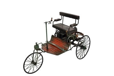Lot 155 - ﻿A diecast model of an 1893 Duryea motor carriage; and another similar