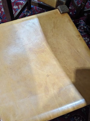 Lot 15 - Robert ‘Mouseman’ Thompson of Kilburn: a set of eight rare oak and leather panel back dining chairs