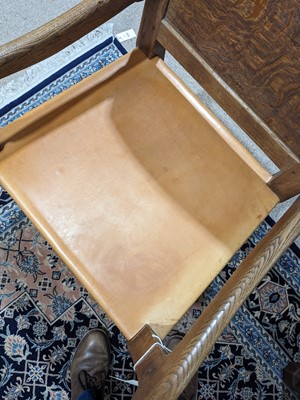Lot 15 - Robert ‘Mouseman’ Thompson of Kilburn: a set of eight rare oak and leather panel back dining chairs