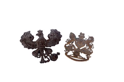 Lot 28 - Two helmet plates, one British the other German
