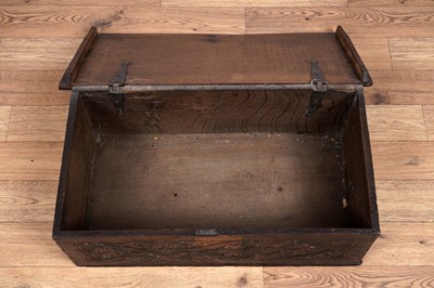 Lot 59 - A carved oak bible box, basically 17th Century