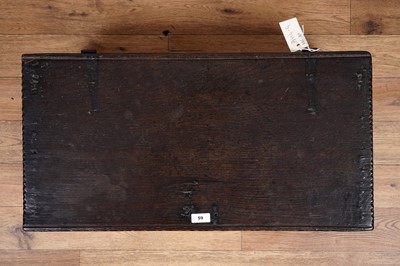 Lot 59 - A carved oak bible box, basically 17th Century