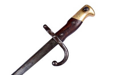 Lot 121 - A First World War Imperial German trench shovel; and other military items
