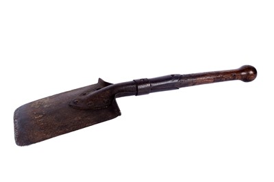 Lot 121 - A First World War Imperial German trench shovel; and other military items