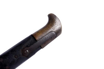 Lot 121 - A First World War Imperial German trench shovel; and other military items