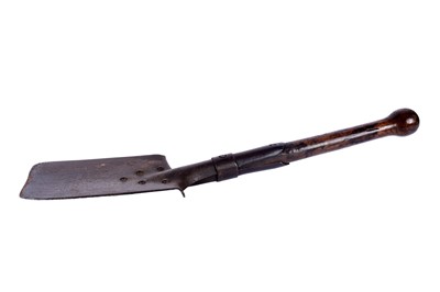 Lot 121 - A First World War Imperial German trench shovel; and other military items