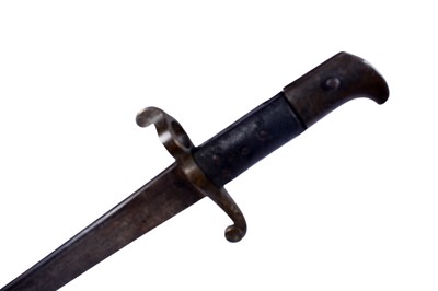 Lot 121 - A First World War Imperial German trench shovel; and other military items