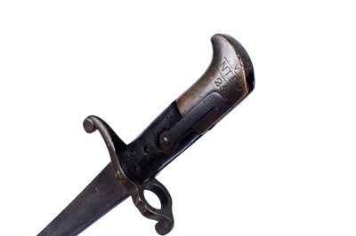 Lot 121 - A First World War Imperial German trench shovel; and other military items
