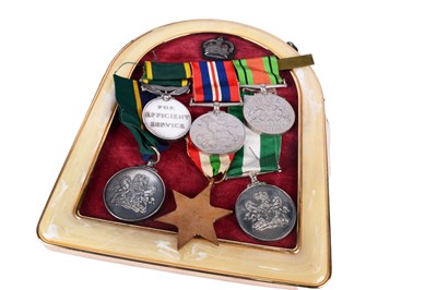 Lot 166 - A group of Second World War and other medals relating to Nigerian Police