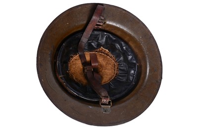 Lot 191 - Two Brodie helmets; and another