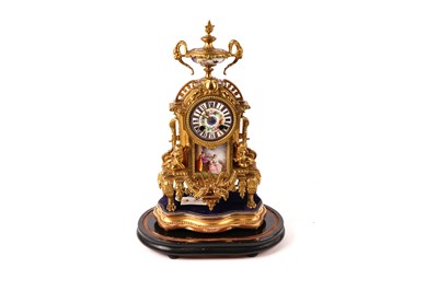 Lot 1370 - A 19th Century Continental porcelain and ormolu mantle clock