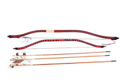 Lot 24A - Two Japanese archery bows; and three arrows