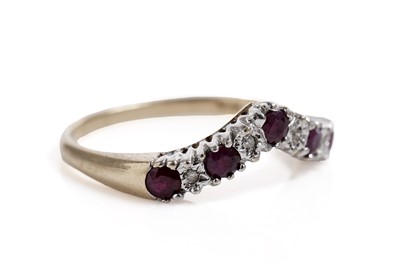 Lot 578 - A ruby and diamond wishbone half hoop eternity ring
