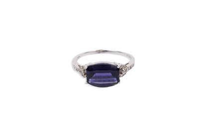 Lot 675 - An iolite and diamond ring