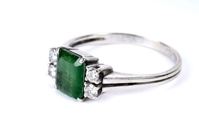 Lot 771 - A green stone doublet and diamond ring