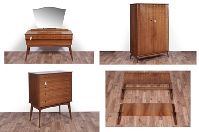 Lot 550 - Alfred Cox (AC Furniture), probably for Heals: a Mid-Century walnut four-piece bedroom suite