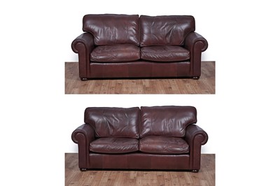 Lot 444 - Wade: a pair of 'Berrington' brown leather sofas