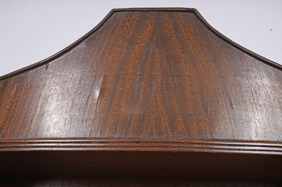 Lot 33 - A Victorian style button back tub armchair; and a Georgian style bowfront bookcase