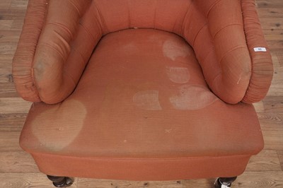 Lot 33 - A Victorian style button back tub armchair; and a Georgian style bowfront bookcase