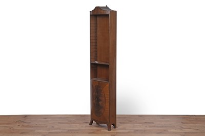 Lot 33 - A Victorian style button back tub armchair; and a Georgian style bowfront bookcase