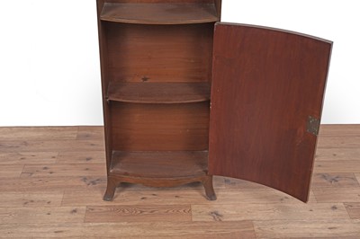 Lot 33 - A Victorian style button back tub armchair; and a Georgian style bowfront bookcase