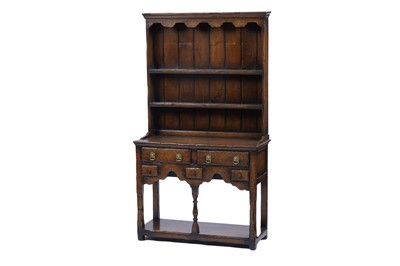Lot 1499 - A Georgian style oak dresser by Titchmarsh & Goodwin