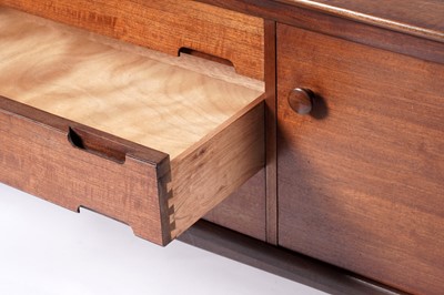 Lot 59 - A mid-20th Century teak and Afromosia matched dining room suite