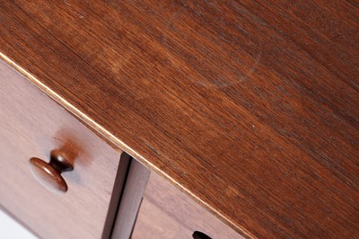 Lot 59 - A mid-20th Century teak and Afromosia matched dining room suite