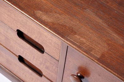 Lot 59 - A mid-20th Century teak and Afromosia matched dining room suite