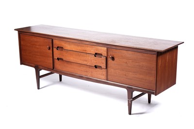 Lot 59 - A mid-20th Century teak and Afromosia matched dining room suite