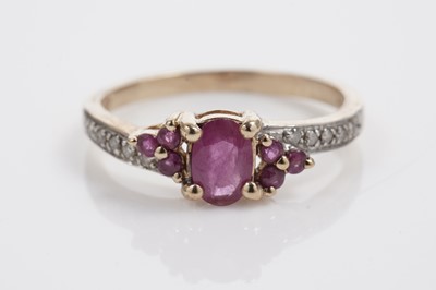 Lot 611 - A ruby and diamond dress ring