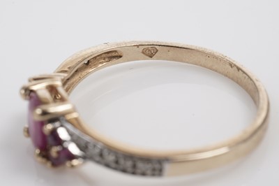 Lot 611 - A ruby and diamond dress ring