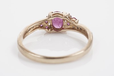 Lot 611 - A ruby and diamond dress ring