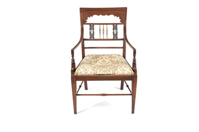 Lot 1281 - A late 19th Century walnut armchair in the manner of Liberty