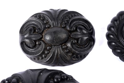 Lot 1492 - Nine Victorian Etruscan revival jet and faux jet brooches