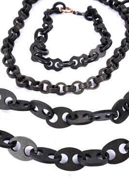 Lot 1495 - Late Victorian jet, and French jet brooches, chains and a choker