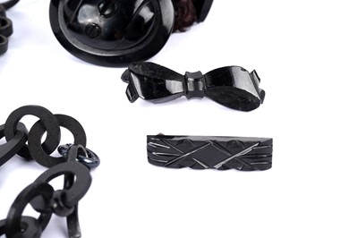 Lot 1495 - Late Victorian jet, and French jet brooches, chains and a choker