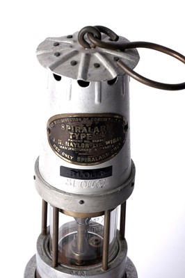 Lot 1442 - Two miners’ lamps; and another