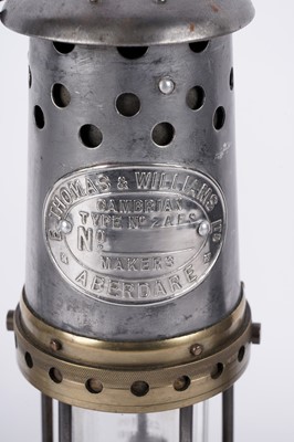Lot 1443 - Three miners’ lamps; together with a Clanny style lamp