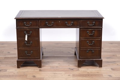 Lot 65 - A Georgian style mahogany pedestal desk