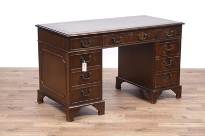 Lot 65 - A Georgian style mahogany pedestal desk