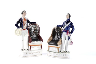 Lot 1096 - A pair of Staffordshire figures